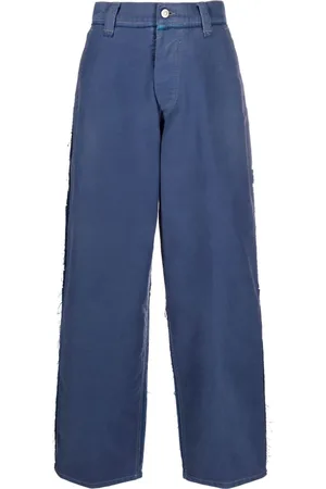 Maison Margiela Jeans a gamba ampia con effetto vissuto