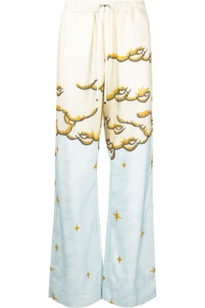 AMIRI Pantaloni svasati con stampa