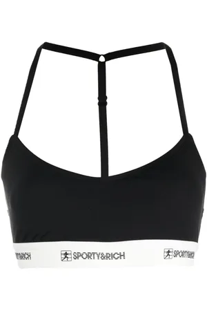 Sporty & Rich Top crop con banda logo