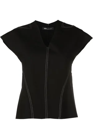 Uma Raquel Davidowicz Top con scollo a V