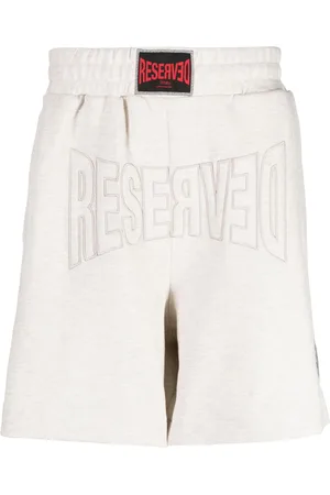Izzue Shorts sportivi con applicazione