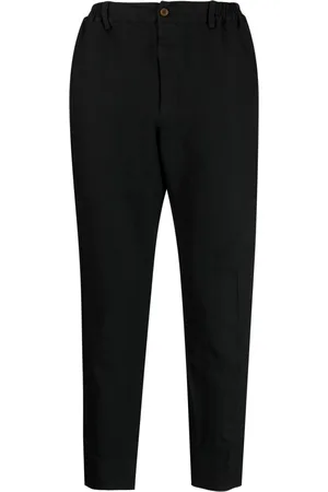 Comme des Garçons Pantaloni affusolati con motivo chevron
