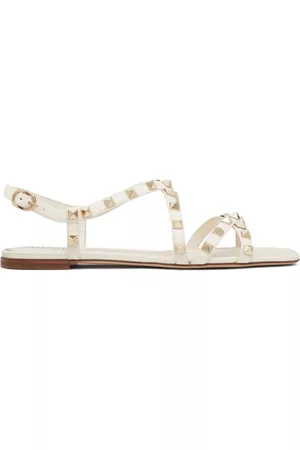 VALENTINO GARAVANI Donna Sandali - Sandali Rockstud con suola piatta - Bianco