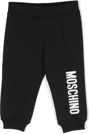Moschino Pantaloni sportivi affusolati con stampa