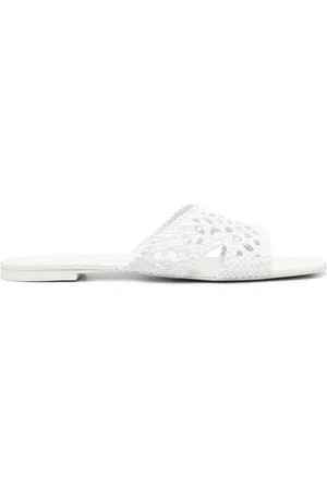 Tory Burch Mules con dettaglio a taglio laser