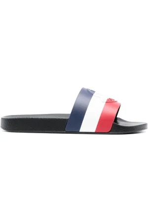 Moncler Sandali slides a righe con logo goffrato