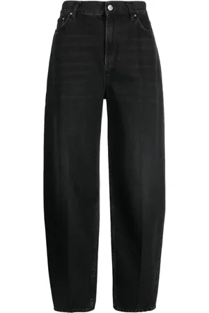 Totême Jeans affusolati con effetto schiarito
