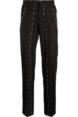 KIDSUPER STUDIOS Pantaloni dritti con cuciture a contrasto