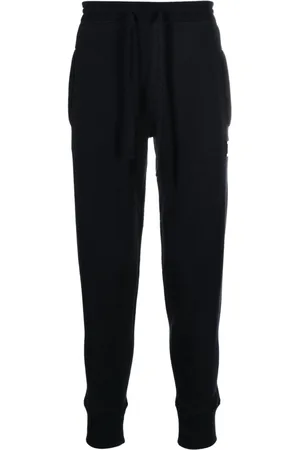 Dolce & Gabbana Pantaloni sportivi con placca logo