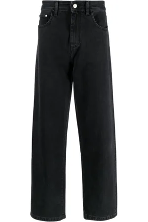 GCDS Jeans a gamba ampia con stampa