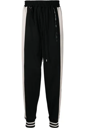 MASTERMIND Pantaloni sportivi con dettaglio a righe