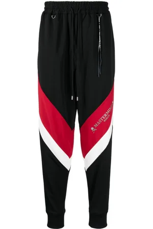 MASTERMIND Pantaloni sportivi con stampa