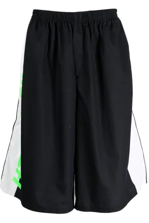 Haider Ackermann Shorts sportivi con stampa