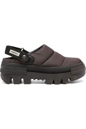 Premiata Mules con cinturino posteriore