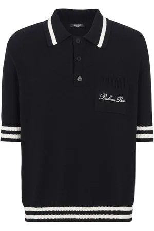 Balmain Polo a righe con ricamo