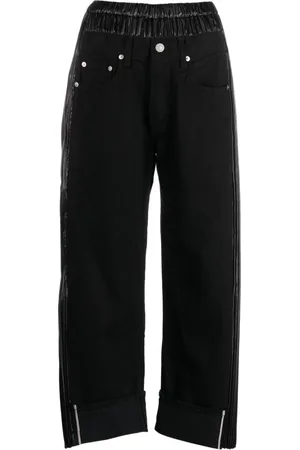 JUNYA WATANABE Jeans crop con applicazione logo