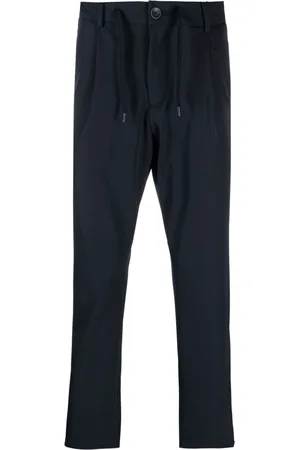 HERNO Pantaloni affusolati con placca logo