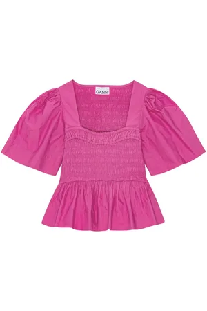 Ganni Blusa con balza