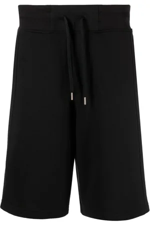 VERSACE Shorts sportivi con applicazione