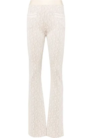 Palm Angels Pantaloni svasati con vita media