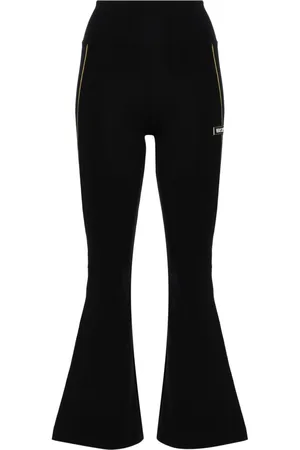 VERSACE Leggings con applicazione svasati