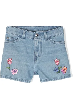 VERSACE Shorts denim a fiori