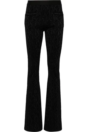Palm Angels Pantaloni svasati con effetto jacquard