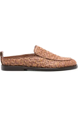 GCDS Mules con monogramma goffrato
