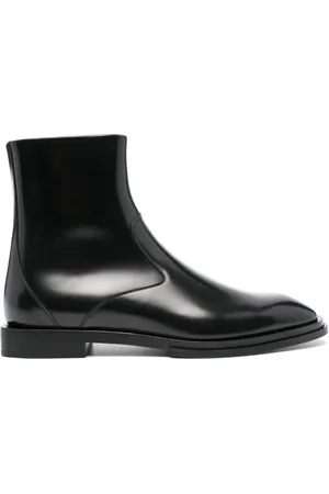 Alexander McQueen Stivali con logo inciso