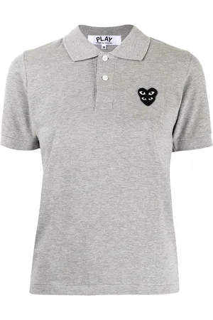 Comme des Garçons Polo con applicazione