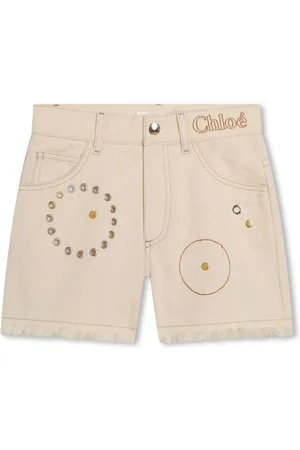 Chloé Shorts denim con occhielli