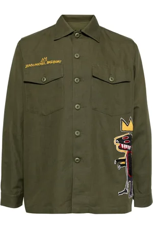 Maharishi Pantaloni con ricamo x Jean-Michel Basquiat