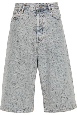 Acne Studios Shorts denim con monogramma jacquard