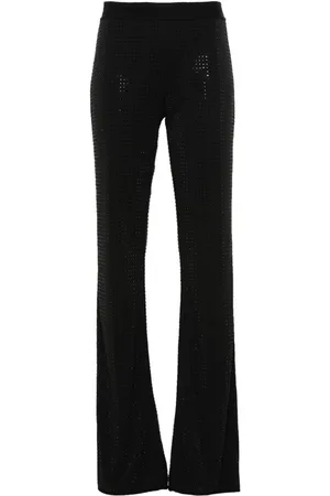 VERSACE Pantaloni svasati con strass