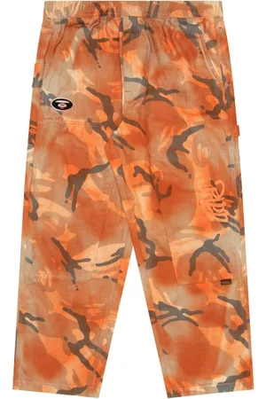 A Bathing Ape Pantaloni con stampa camouflage