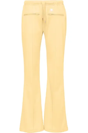 Courrèges Pantaloni ampi con applicazione logo