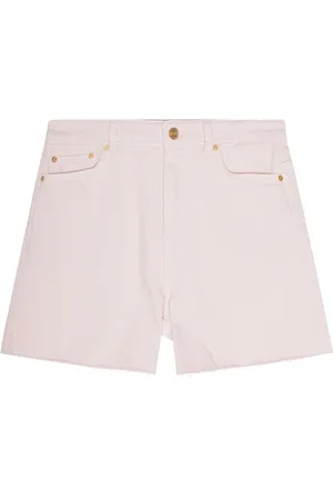 Ganni Shorts denim con orlo a taglio vivo