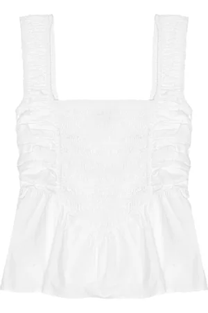 Ganni Blusa con peplum