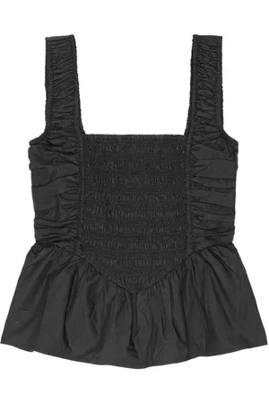Ganni Blusa con peplum