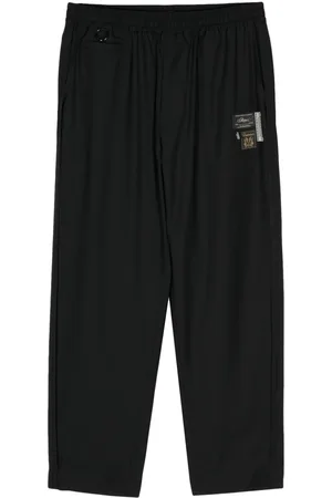 UNDERCOVER Pantaloni dritti con applicazione logo