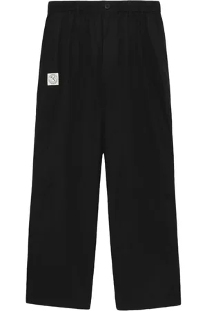 Izzue Pantaloni ampi con applicazione logo