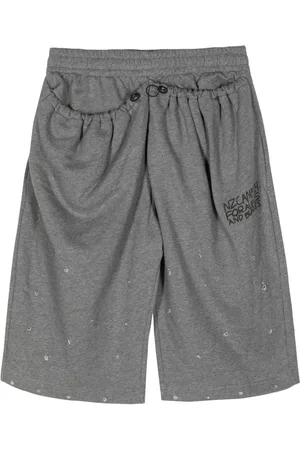 Natasha Zinko Shorts sportivi con effetto vissuto