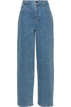 ROTATE Jeans a gamba ampia con strass