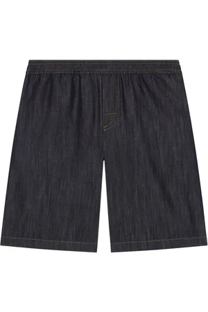 Dolce & Gabbana Shorts denim con ricamo DG