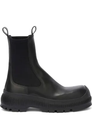 Jil Sander Stivali con logo goffrato