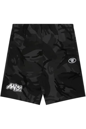 A Bathing Ape Shorts sportivi con stampa camouflage