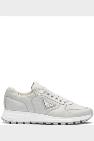 Prada Sneakers con placca logo