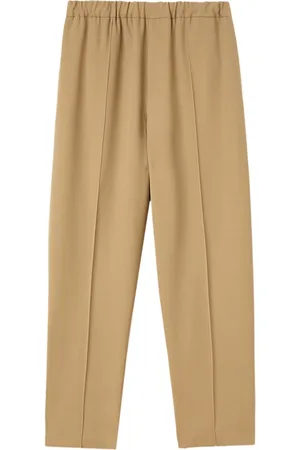Jil Sander Pantaloni affusolati con vita elasticizzata