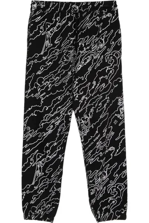 Maharishi Pantaloni sportivi Maha Basquiat affusolati