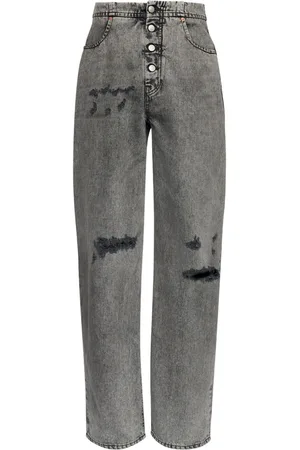 Maison Margiela Jeans a gamba ampia con effetto vissuto